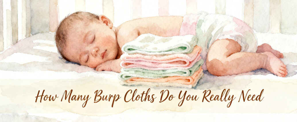 stack of folded burp cloths next to a newborn