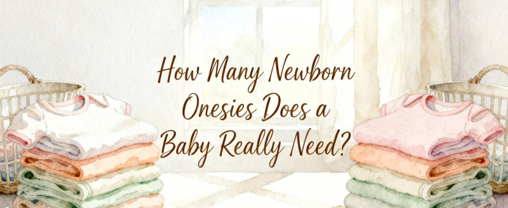 stack of folded newborn onesies sorted by size on a changing table