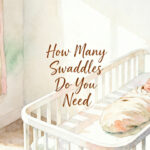 newborn baby wrapped snugly in a swaddle blanket lying in a bassinet