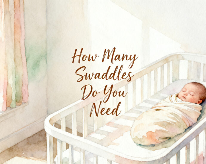 newborn baby wrapped snugly in a swaddle blanket lying in a bassinet