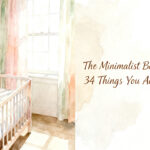 flat lay of minimalist baby registry essentials including onesies, bottles, and swaddles