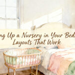 bedroom nursery setup with bassinet beside a parent bed in a softly lit room